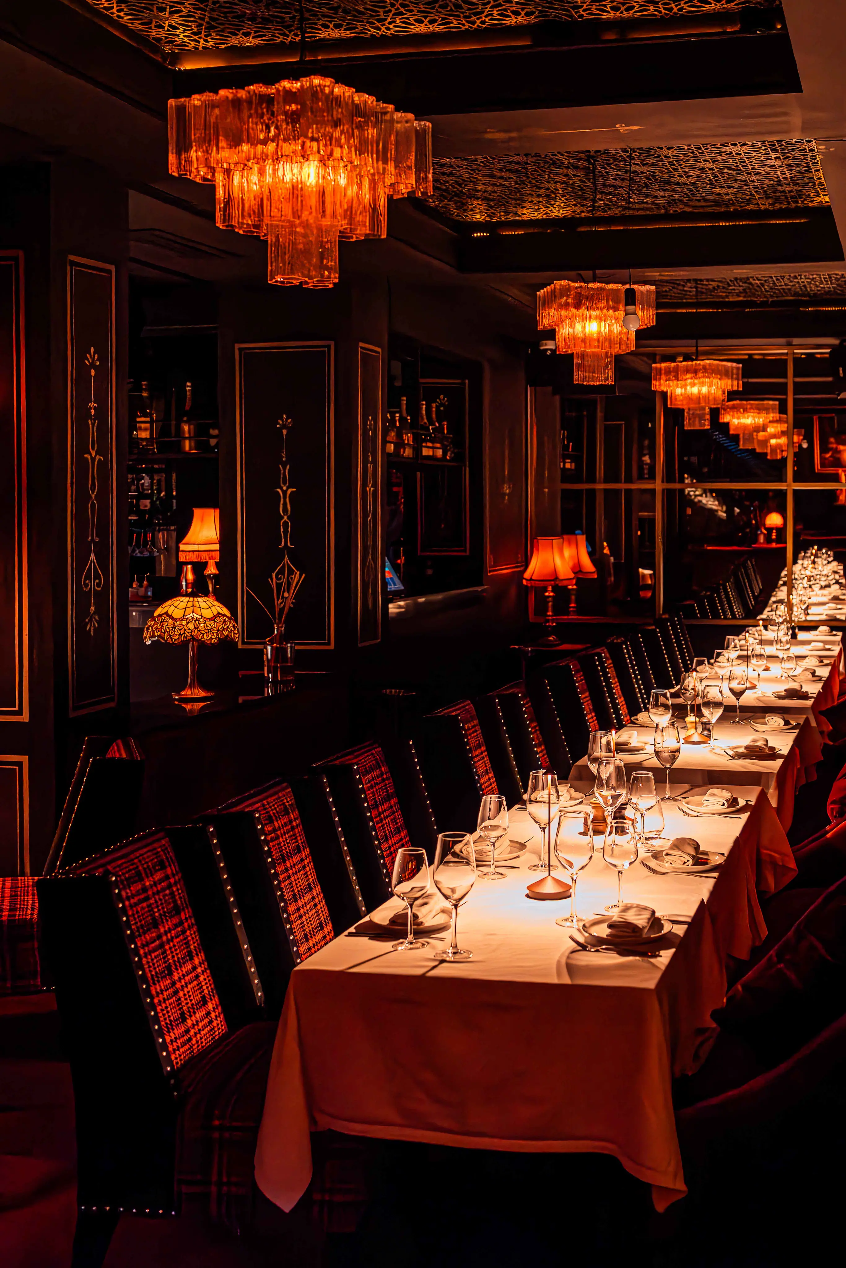 A chic 1920s speakeasy vibe inside a luxury lounge restaurant in Marrakech.